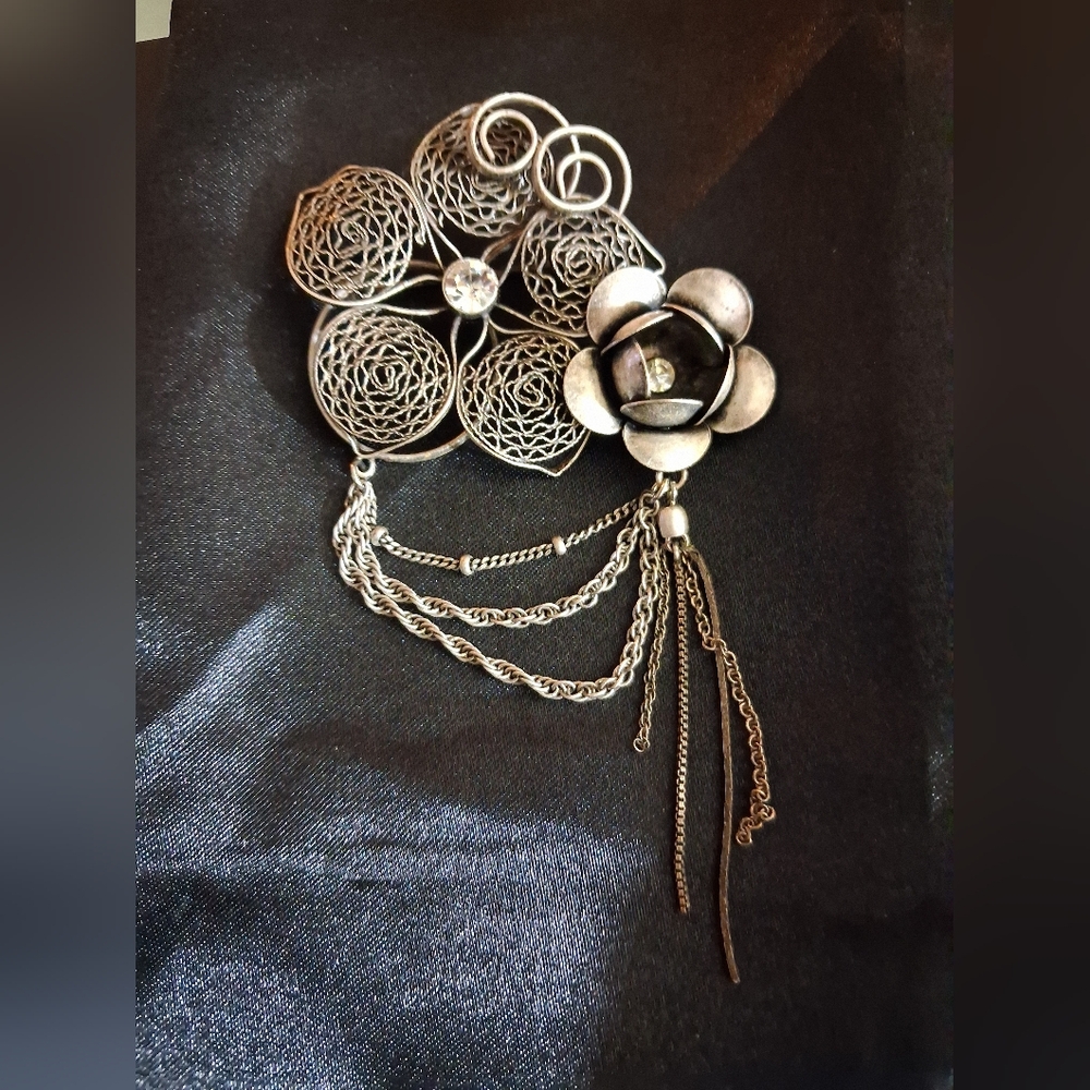 Elegant Silver Floral Brooch